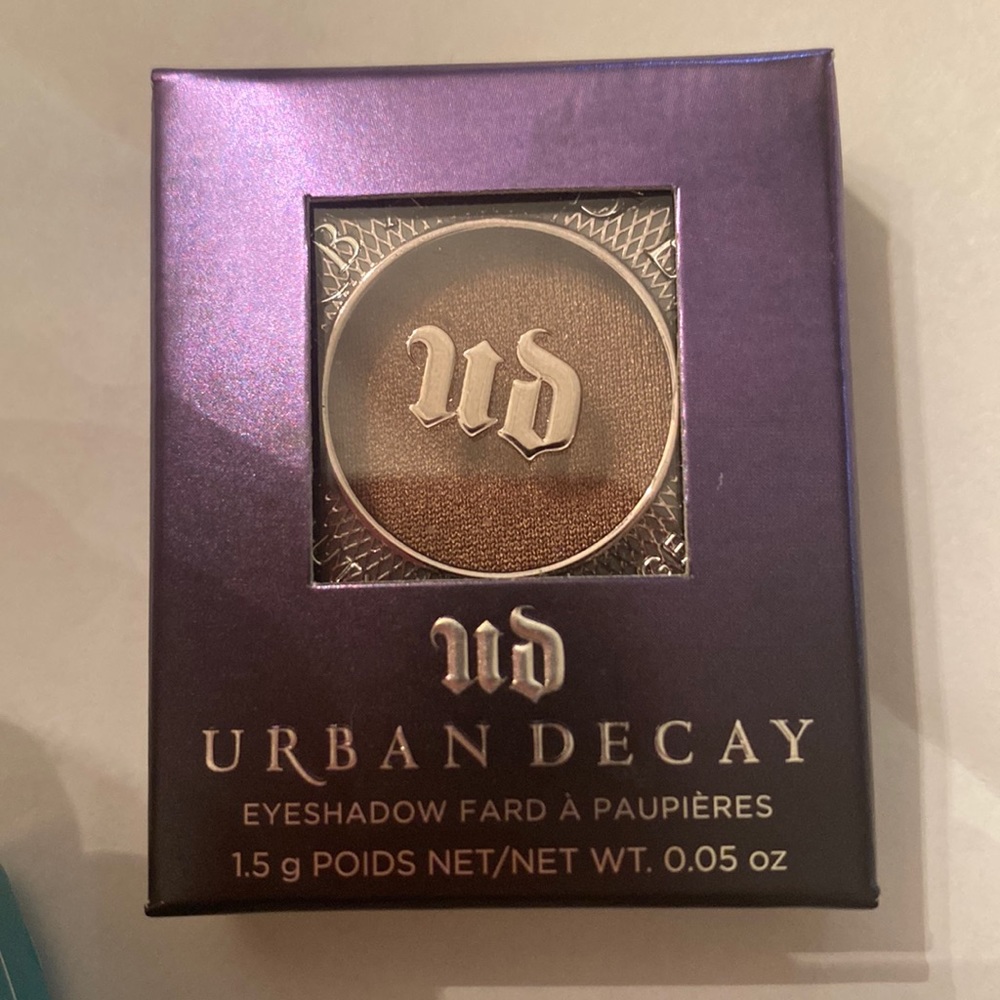 Urban Decay eyeshadow. Toasted too light for my skin color. Toasted